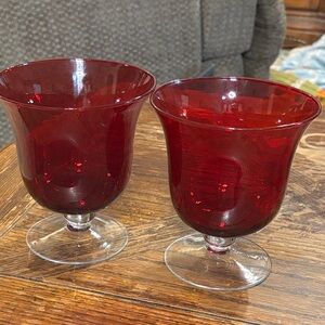 Pair of red glass vases or candle holders
